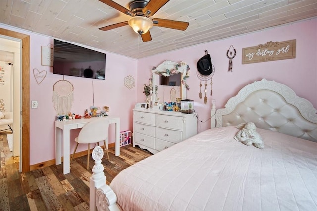 bedroom with ceiling fan, wood-type flooring, and wooden ceiling