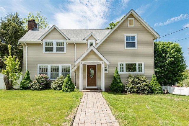 traditional home featuring a chimney