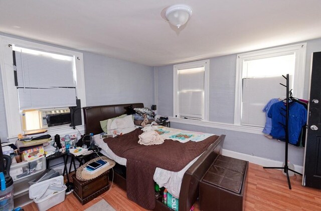 13 Main St, Framingham, MA 01702 - bedroom with wood finished floors and baseboards