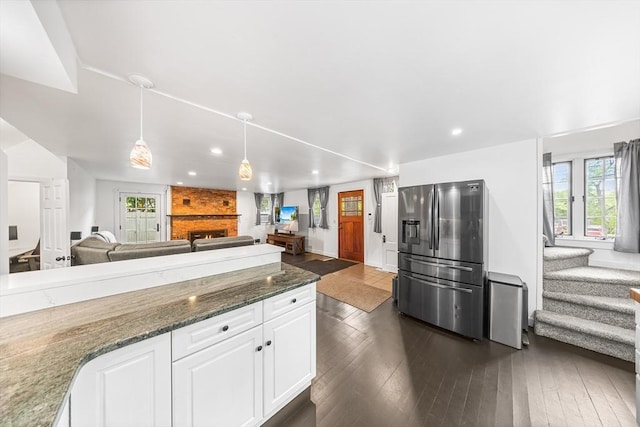 11 N Hancock St, Lexington, MA 02420 - kitchen with stainless steel fridge with ice dispenser, open floor plan, recessed lighting, white cabinetry, and dark wood-style flooring