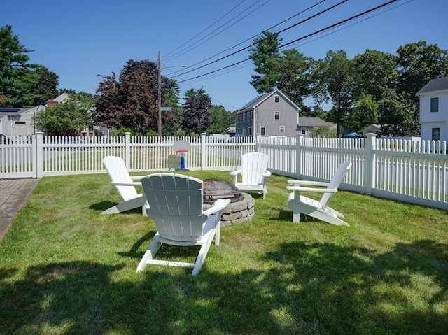 19 Mohawk Rd, Burlington, MA 01803 - view of yard featuring an outdoor fire pit and a fenced backyard