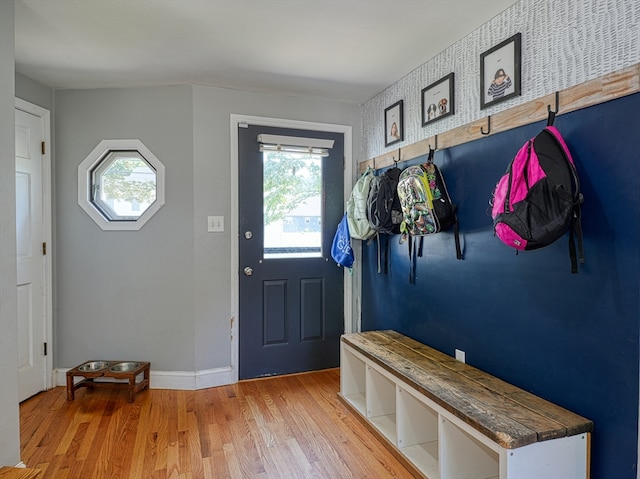 mudroom with light hardwood / wood-style flooring