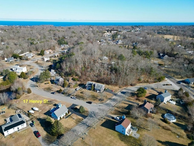 drone / aerial view featuring a view of trees