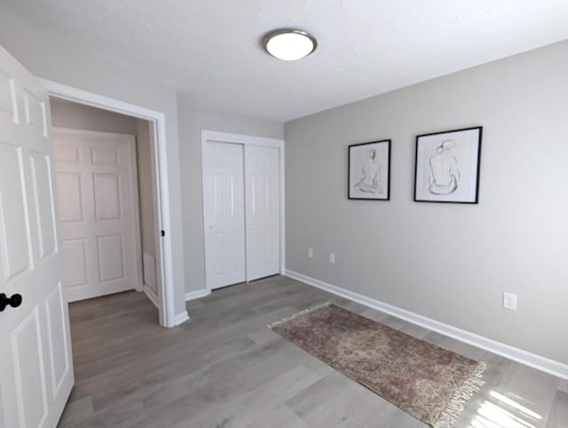 3202 Halcyon Dr Unit 3202, Worcester, MA 01606 - unfurnished bedroom with light wood finished floors and a closet