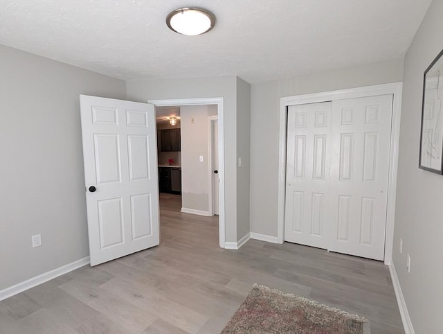 3202 Halcyon Dr Unit 3202, Worcester, MA 01606 - unfurnished bedroom featuring light wood finished floors and a closet