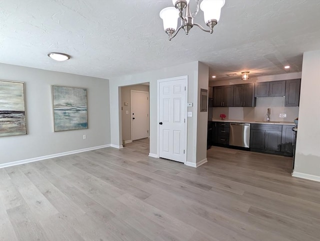 3202 Halcyon Dr Unit 3202, Worcester, MA 01606 - kitchen featuring dishwasher, a chandelier, light wood-type flooring, dark brown cabinetry, and light countertops