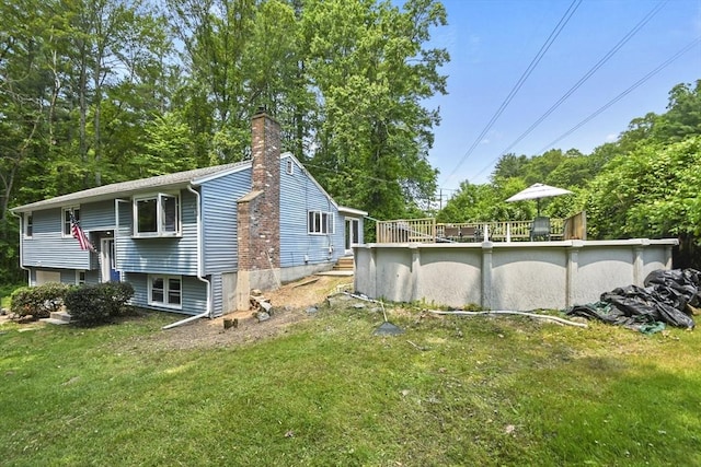 175 Armsby Rd, Sutton, MA 01590 - view of side of property featuring a chimney, a yard, and an outdoor pool