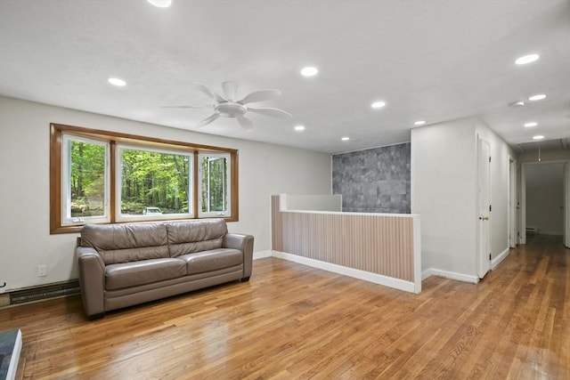 175 Armsby Rd, Sutton, MA 01590 - living room featuring light wood-style floors, recessed lighting, attic access, ceiling fan, and baseboards