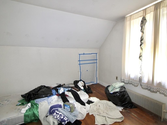 554 Wachusett St, Holden, MA 01520 - bonus room with radiator heating unit, wood finished floors, and vaulted ceiling