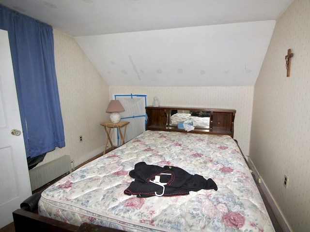 554 Wachusett St, Holden, MA 01520 - bedroom featuring wallpapered walls, lofted ceiling, and radiator heating unit