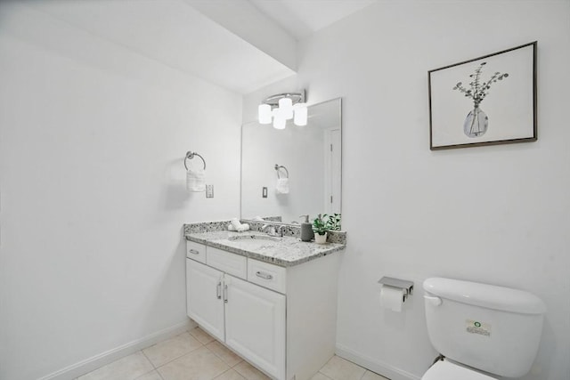 7 Conant Rd Unit 23, Winchester, MA 01890 - bathroom with vanity, toilet, baseboards, and tile patterned flooring