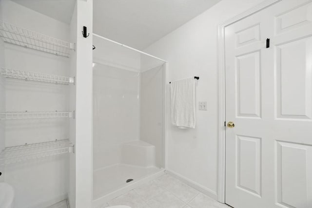 7 Conant Rd Unit 23, Winchester, MA 01890 - full bathroom with walk in shower, baseboards, and tile patterned floors