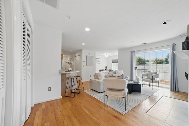 7 Conant Rd Unit 23, Winchester, MA 01890 - living room featuring light wood-style floors, recessed lighting, and baseboards