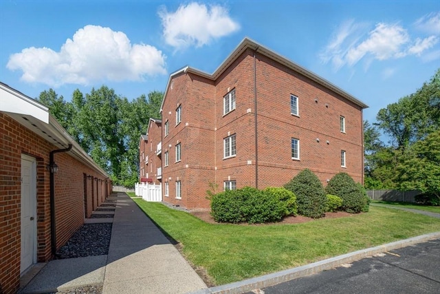 7 Conant Rd Unit 23, Winchester, MA 01890 - view of side of home featuring brick siding