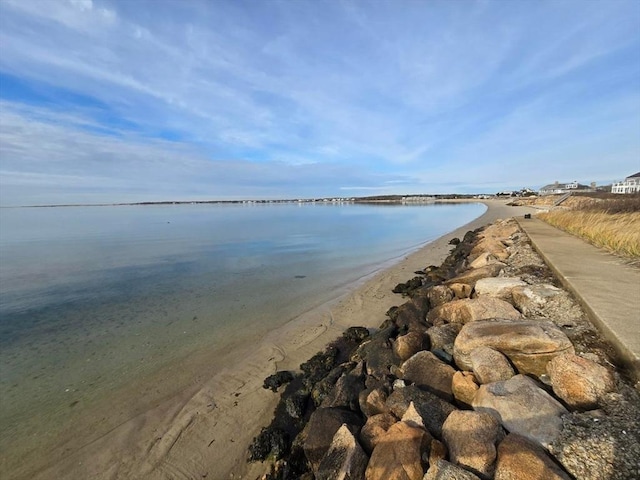 view of water feature with a beach view