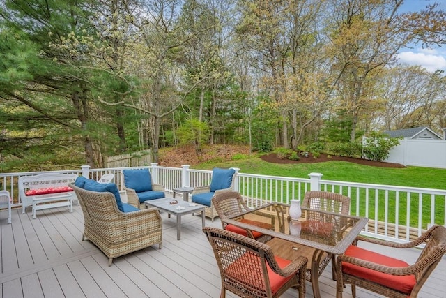 deck featuring outdoor dining space and outdoor lounge area