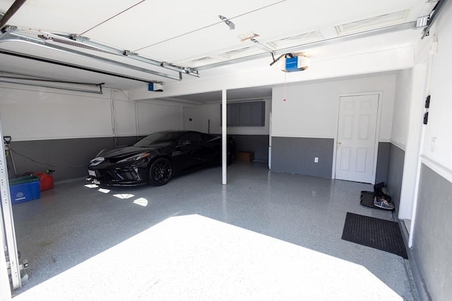 garage featuring a garage door opener