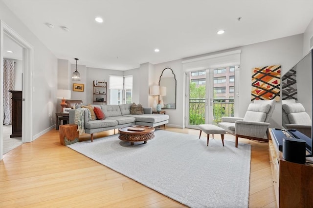 16 Miner St Unit 307, Boston, MA 02215 - living room with light wood-type flooring, recessed lighting, and baseboards