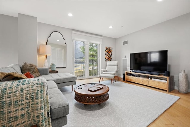 16 Miner St Unit 307, Boston, MA 02215 - living area featuring wood finished floors and recessed lighting