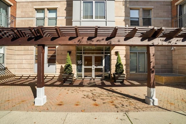 16 Miner St Unit 307, Boston, MA 02215 - rear view of house featuring a pergola and french doors