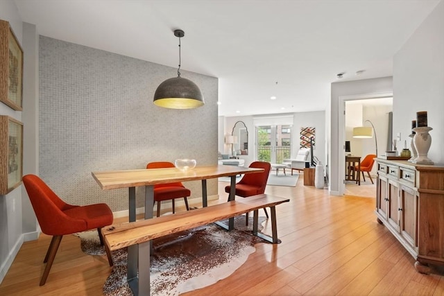 16 Miner St Unit 307, Boston, MA 02215 - dining space featuring an accent wall, light wood-type flooring, baseboards, recessed lighting, and wallpapered walls