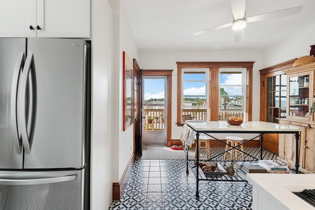 dining space featuring ceiling fan