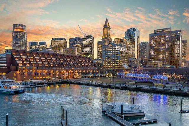 property's view of city featuring a water view