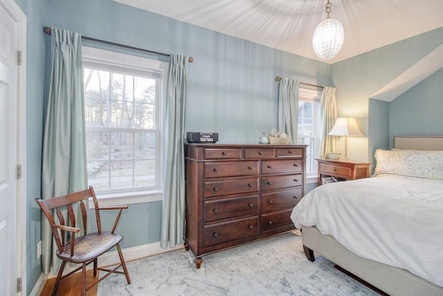 bedroom with baseboards