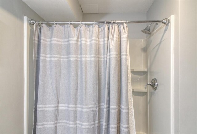 full bathroom featuring curtained shower