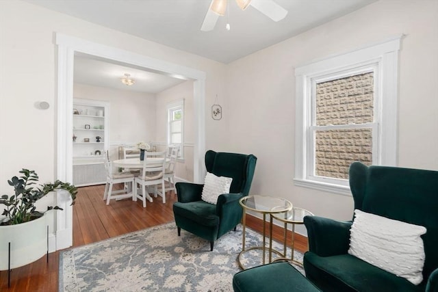 127 Highland Ave, Watertown, MA 02472 - living area featuring wood finished floors and a ceiling fan