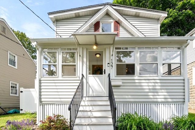 127 Highland Ave, Watertown, MA 02472 - view of front of house with a sunroom