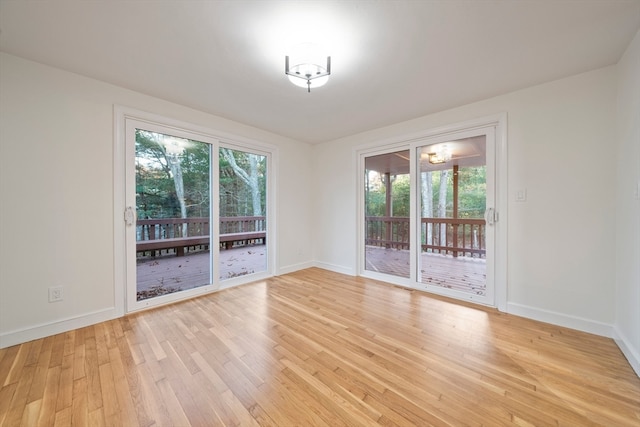 unfurnished dining area featuring light hardwood / wood-style floors