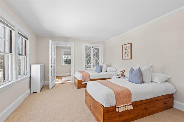 carpeted bedroom featuring crown molding