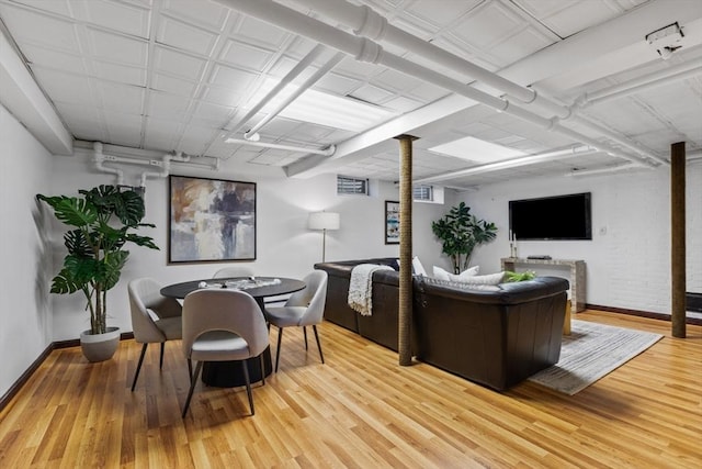 living room with light hardwood / wood-style flooring