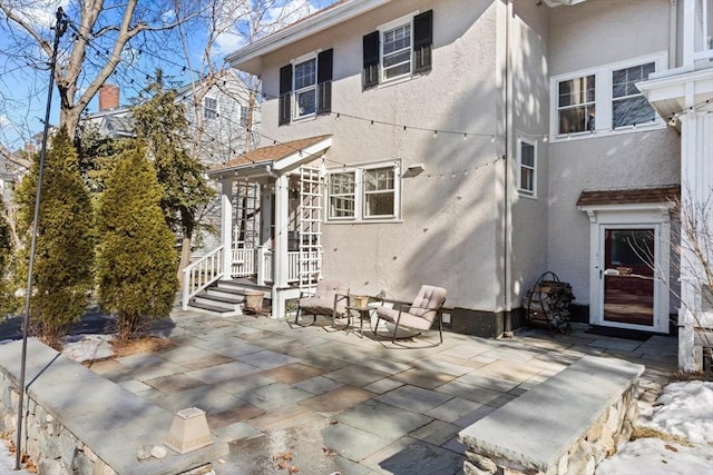 back of house featuring a patio