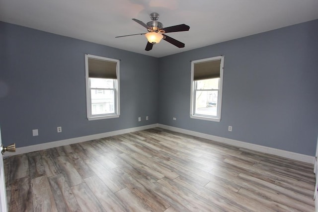 271 Gibson St, Lowell, MA 01851 - unfurnished room featuring wood finished floors, ceiling fan, and baseboards