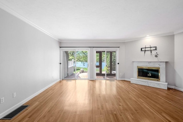 30 Eastern Point Dr Unit 30, Shrewsbury, MA 01545 - unfurnished living room with ornamental molding, wood finished floors, and baseboards