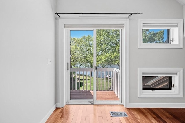 30 Eastern Point Dr Unit 30, Shrewsbury, MA 01545 - doorway featuring wood finished floors and baseboards