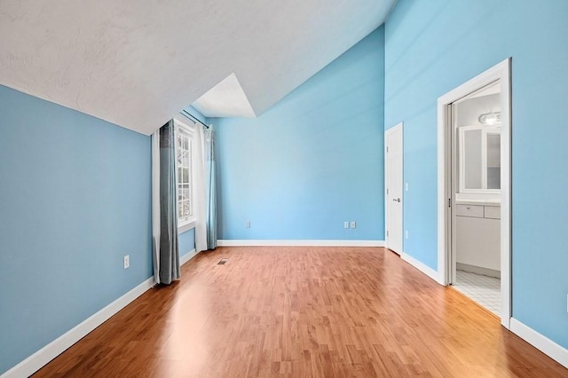 30 Eastern Point Dr Unit 30, Shrewsbury, MA 01545 - bonus room featuring wood finished floors, baseboards, and lofted ceiling