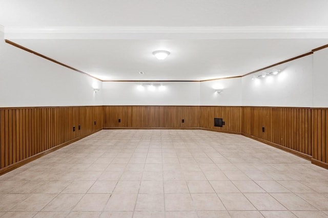 30 Eastern Point Dr Unit 30, Shrewsbury, MA 01545 - below grade area with wainscoting, crown molding, light flooring, and wooden walls