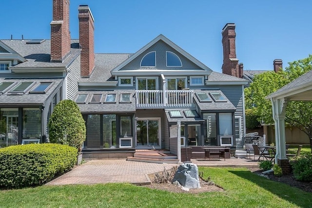 30 Eastern Point Dr Unit 30, Shrewsbury, MA 01545 - rear view of property featuring a balcony, a patio, a chimney, and roof with shingles