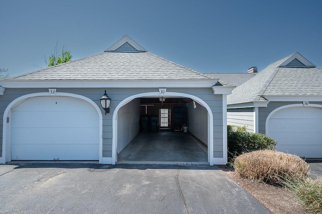 30 Eastern Point Dr Unit 30, Shrewsbury, MA 01545 - garage with asphalt driveway
