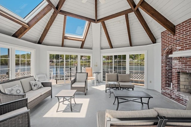 30 Eastern Point Dr Unit 30, Shrewsbury, MA 01545 - living area featuring a skylight, beamed ceiling, high vaulted ceiling, and a fireplace