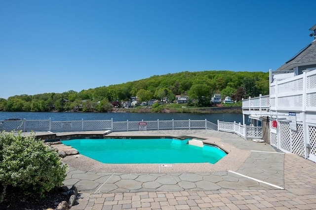 30 Eastern Point Dr Unit 30, Shrewsbury, MA 01545 - view of pool featuring fence, a water view, and a patio area