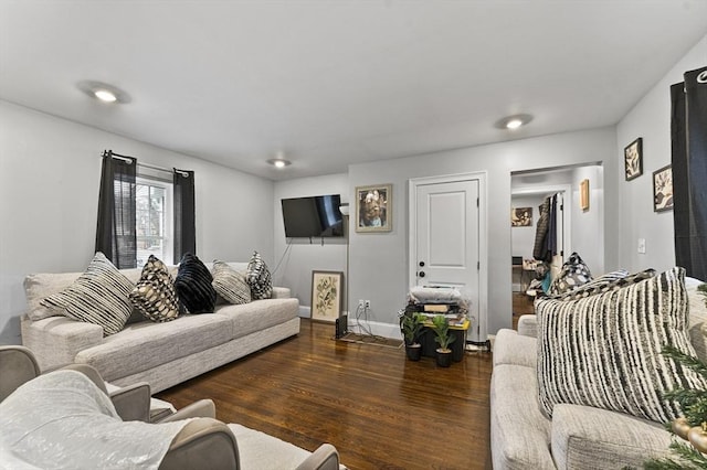 living room featuring dark hardwood / wood-style floors