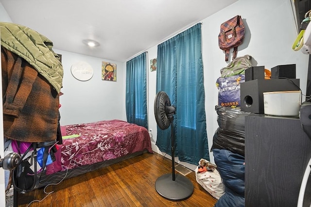 bedroom featuring dark hardwood / wood-style floors