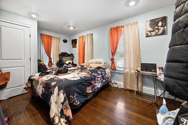 bedroom featuring dark hardwood / wood-style floors