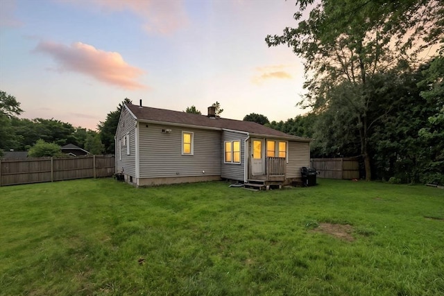 14 Carlton St, South Hadley, MA 01075 - back of property at dusk with a chimney