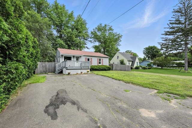 14 Carlton St, South Hadley, MA 01075 - view of front of home with a deck and driveway