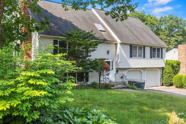 18 Bismark St, Dedham, MA 02026 - view of front of home with a chimney, concrete driveway, a garage, a shingled roof, and a front yard